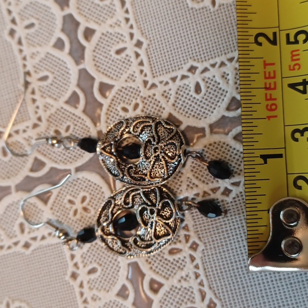 Silver toned and black pierced earrings